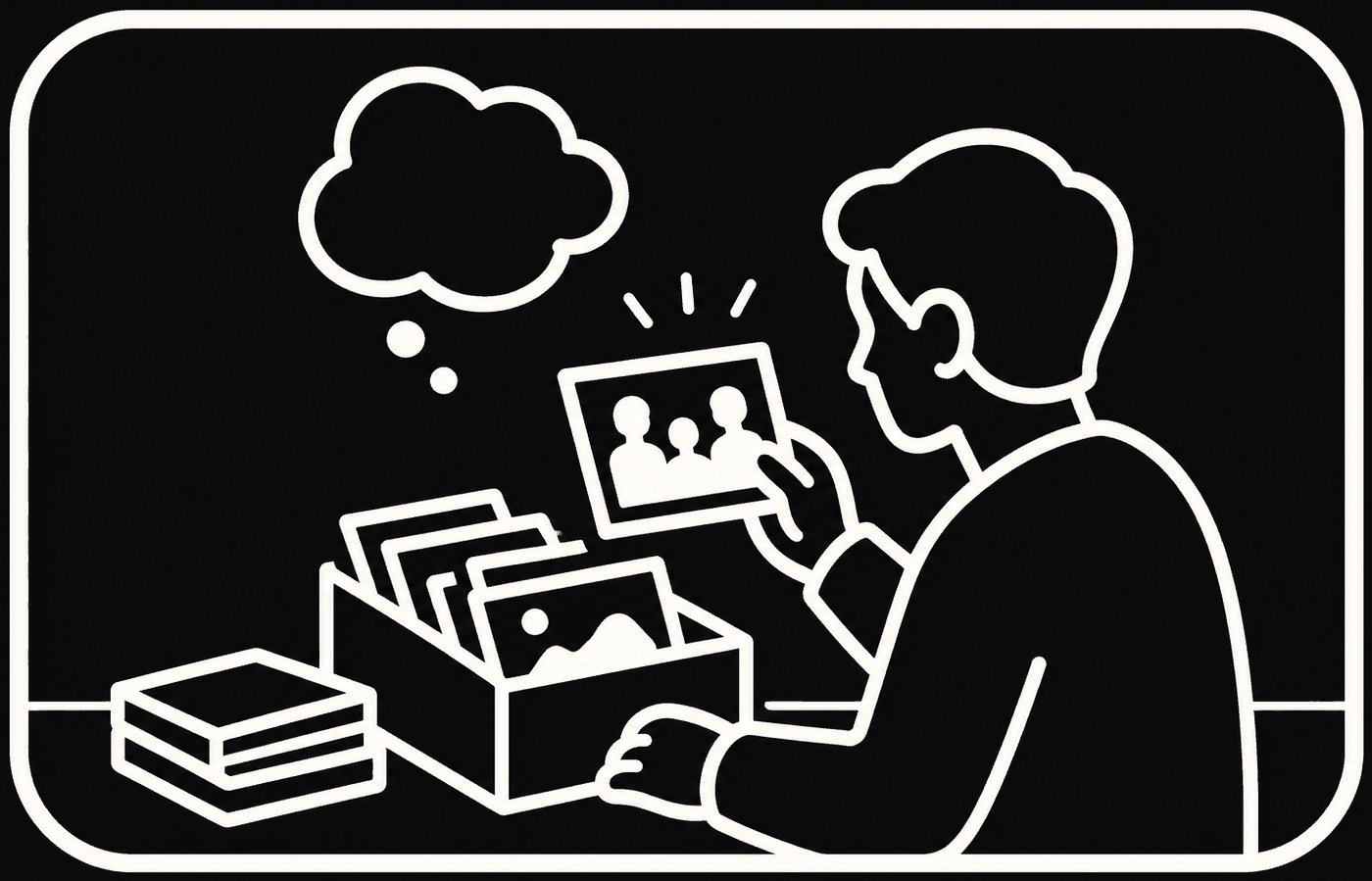 A person at a table lifting a photograph out of a keepsake box, a thought rising above it, finished books stacked alongside.
